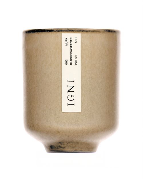 Product image of the IGNI Murk Black Fig & Vetiver luxury scented candle in a beige ceramic vessel, featuring a minimalist vertical label on a clean white background.